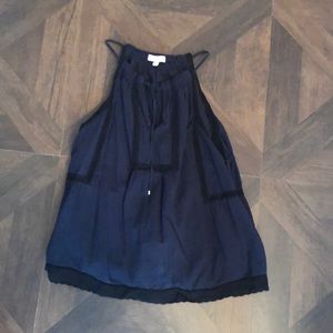 Navy blue tank with black crochet detail.